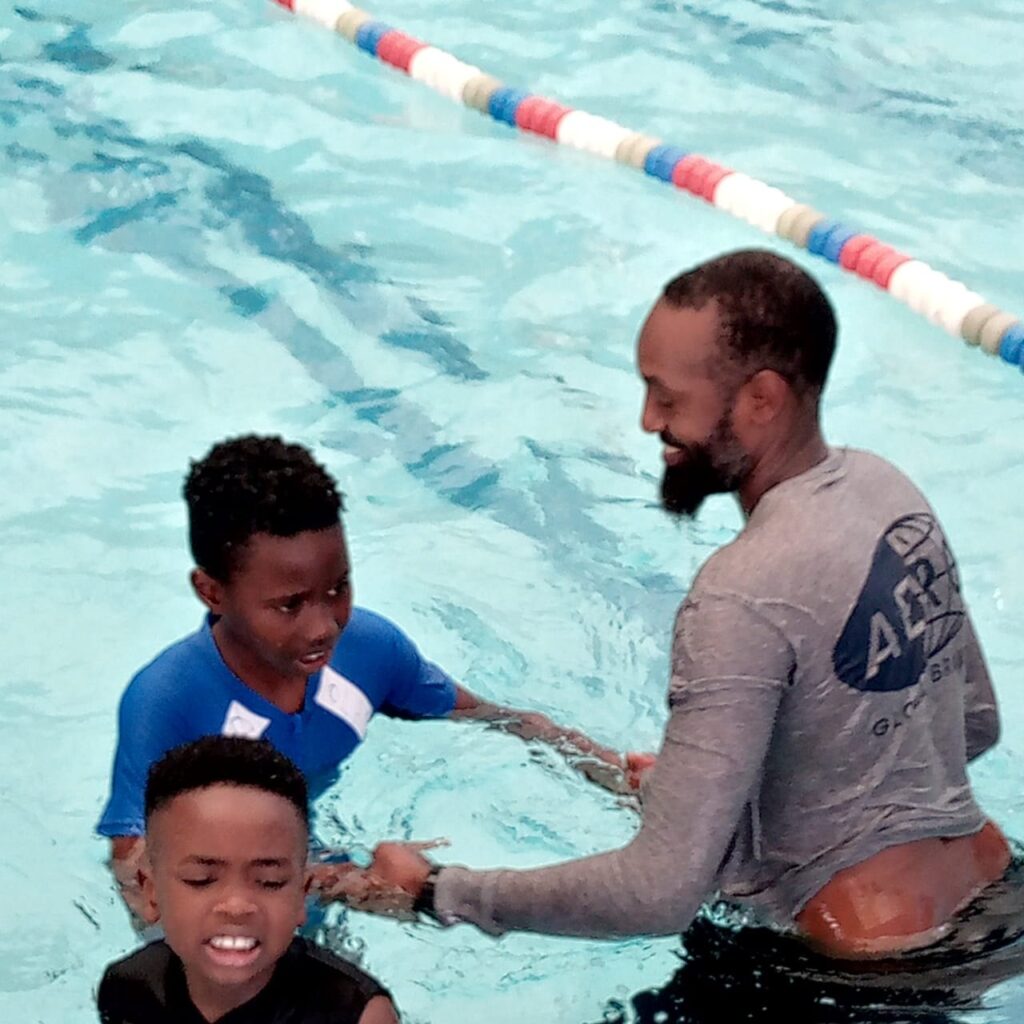 Learners in a guided swimming lesson at Holmeside School