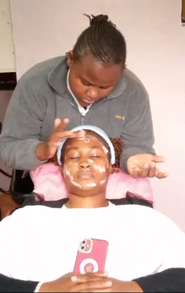 Student participating in a beauty therapy session at Holmeside School