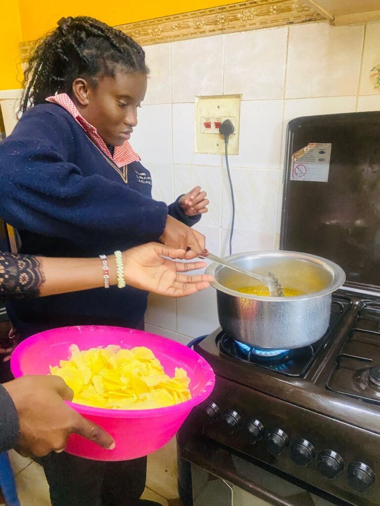 Learners actively participating in a food preparation lesson